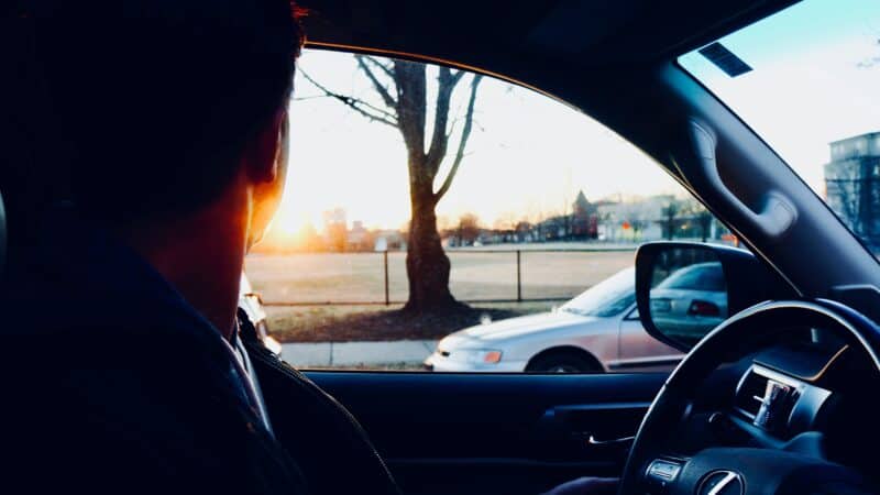 police pull over driver. Photo by Bailey Hall on Unsplash